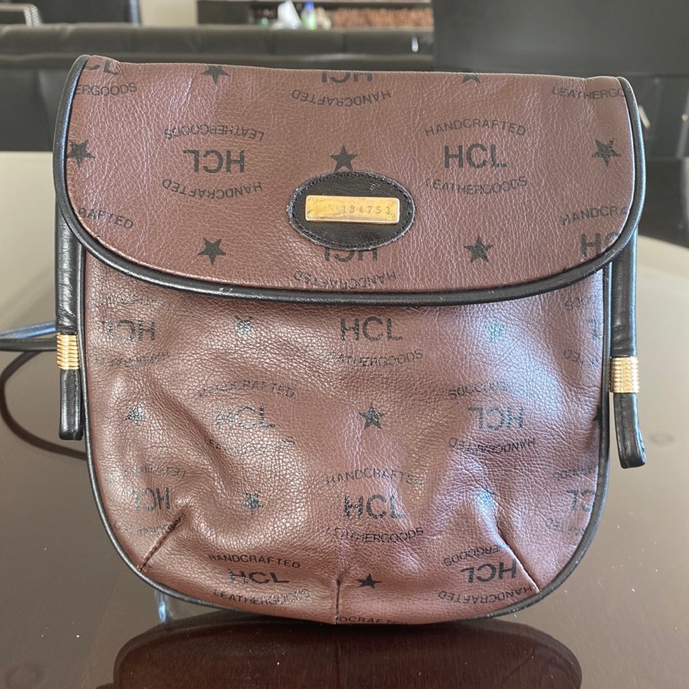 HCL West Germany leather bag and wallet. 24K gold